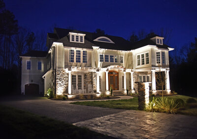  outdoor lighting installation in Front of white two-story home